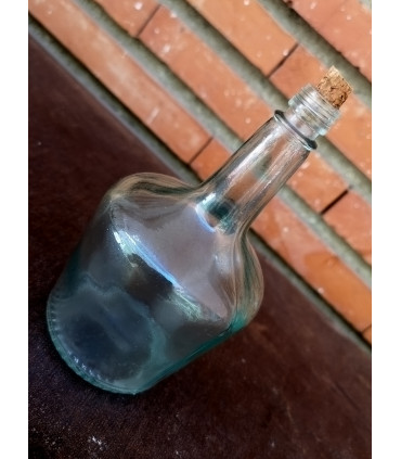 Pequeña botella de cristal